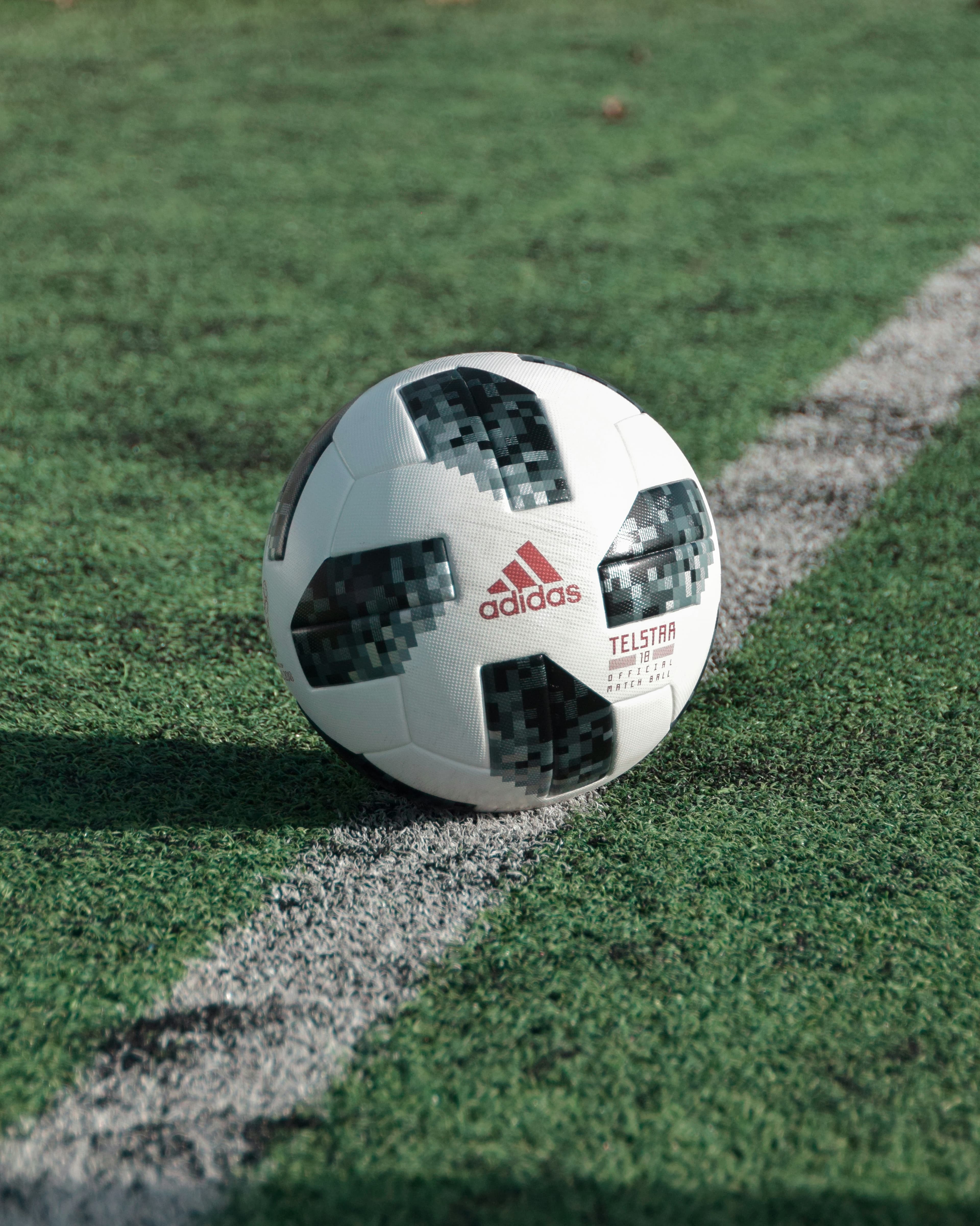 Football resting on a 5-a-side pitch