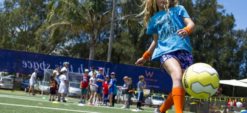Junior Futsal team celebrating together